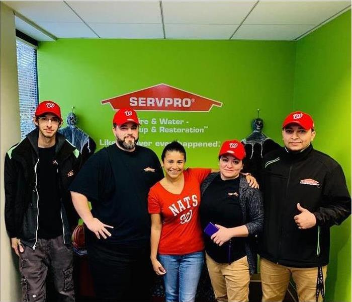 Picture of SERVPRO of Alexandria in Washington Nationals gear 